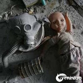 Chernobyl, Exclusion Zone, Ukraine. Dolls and gasmasks litter th