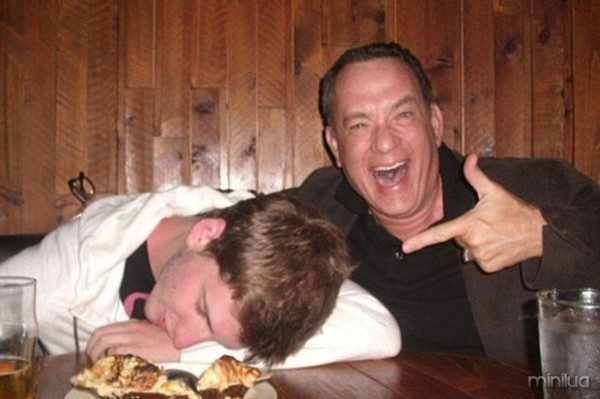 TOM HANKS POSES WITH A DRUNK FAN