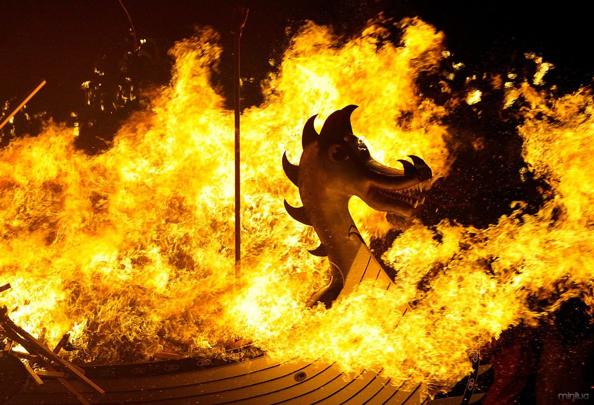 The Viking longboat burns during the annual Up Helly Aa festival in Lerwick, Shetland Islands, on January 28, 2014. Up Helly Aa celebrates the influence of the Scandinavian Vikings in the Shetland Islands and culminates with up to 1,000 'guizers' (men in costume) throwing flaming torches into their Viking longboat and setting it alight later in the evening. (Andy Buchanan/Getty Images)