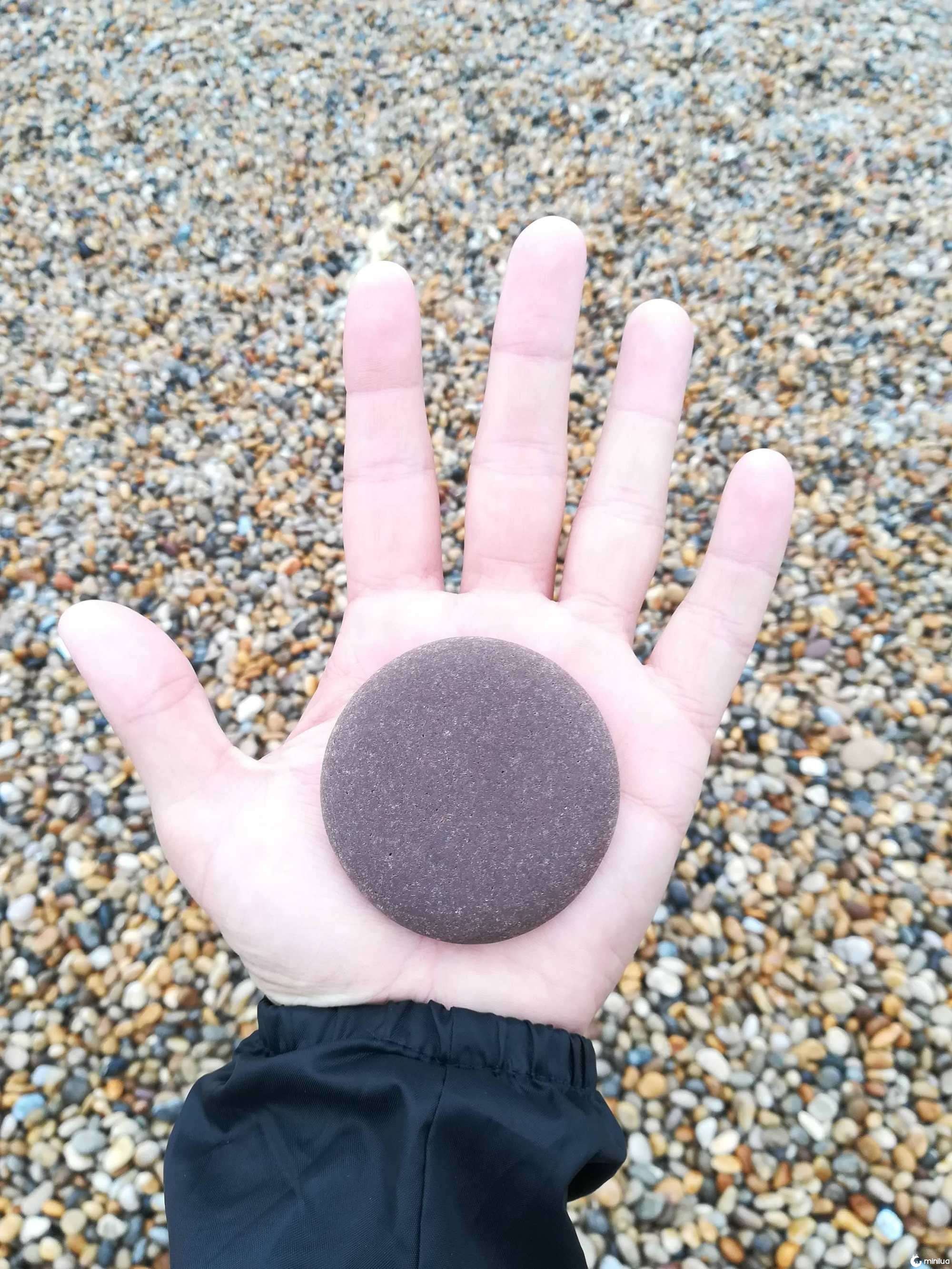 Rocks have bumps and jagged edges, but this little pebble found at the beach looks absolutely perfect.