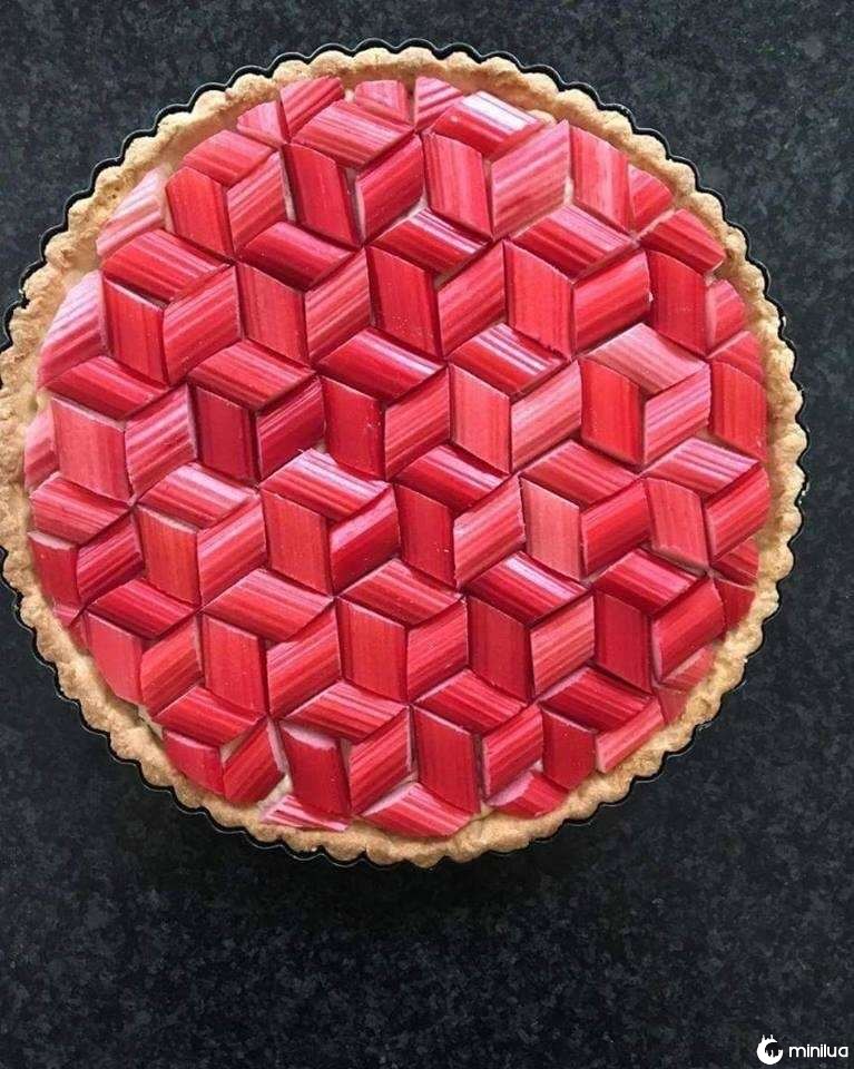 Never has perfection looked as deliciously mouthwatering as this geometrically crimson rhubarb pie.