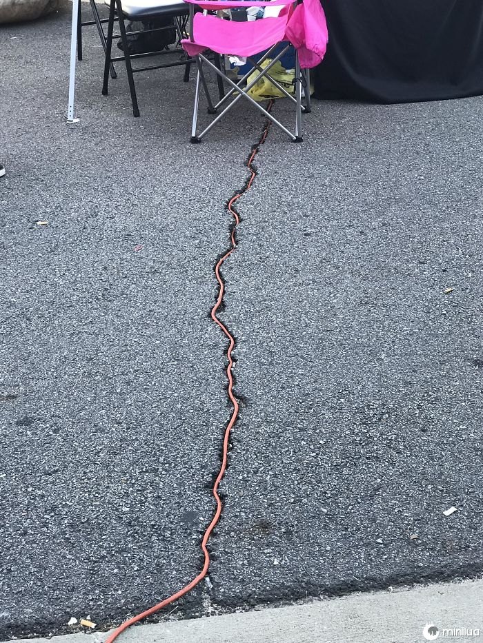 The Way This Extension Cord Was Fit Through This Crack