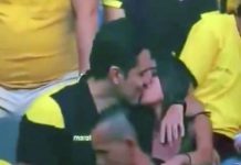 Reação de torcedor torna-se viral ao ser pego na câmera do beijo.