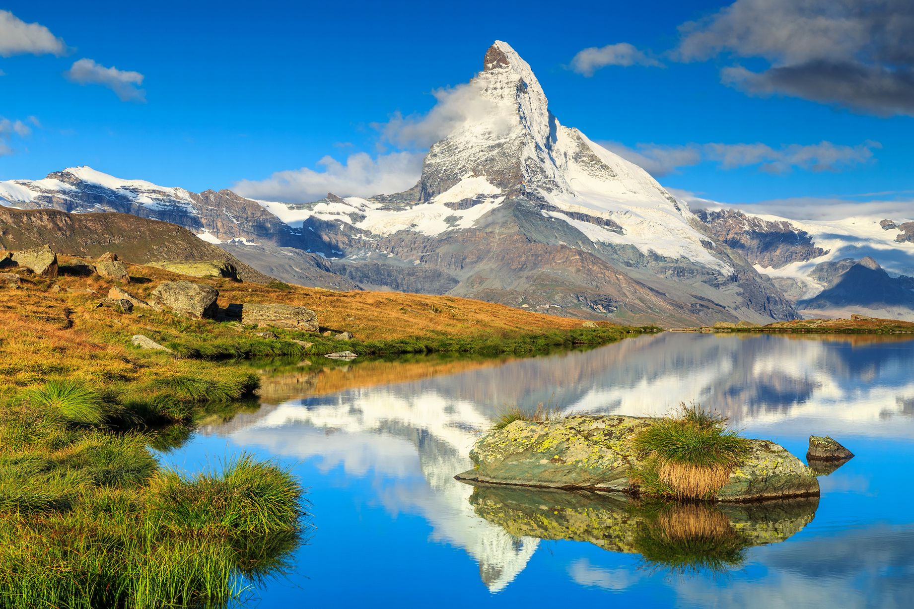 Stunning panorama with Matterhorn and beautiful alpine lake