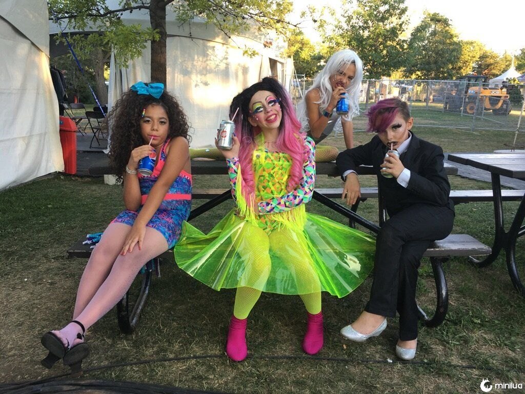 Bracken (center) with other young drag performers,&nbsp;Suzan-Bee Anthony (left), Laddy Gaga (right of center) and Lactatia (