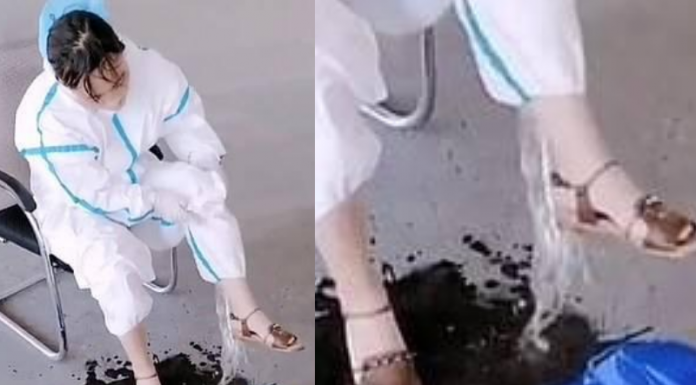 Médica na China derrama baldes de suor de seu traje de proteção contra o Coronavirus